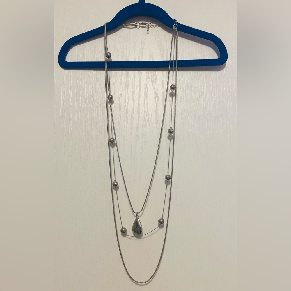 3/$30 Silver tone 3 Layered Necklace with round silver beads& teardrop pendant.